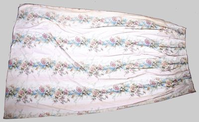 a picture of a white dress with a floral pattern on it