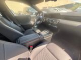 a picture of a car interior with a steering wheel
