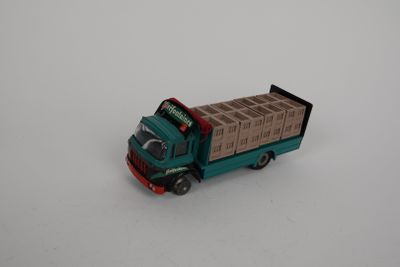 a toy truck with a box on the back of it