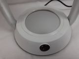 a white light that is on top of a table