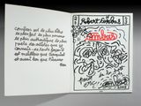 un livre sur lequel figure un dessin et du texte