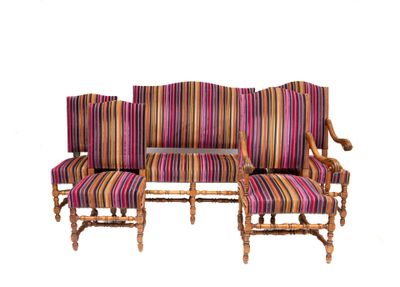 a couch and two chairs that are sitting on a white surface