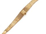 an 18k gold ladies ' s wrist watch