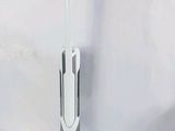 an image of a white and black mop sitting on top of a white floor