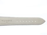 an image of a white watch strap with a silver buckle