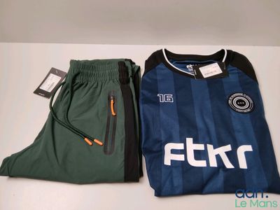 the two pieces of clothing are sitting on the table