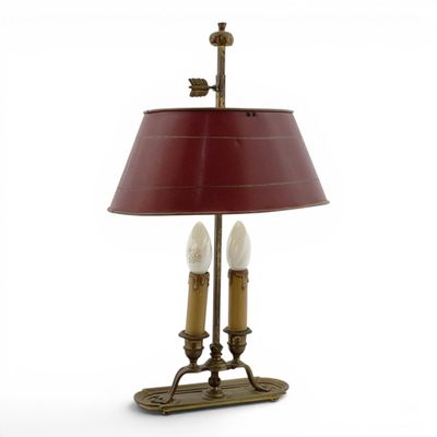 an image of a table lamp with a red shade on it