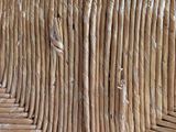 a close up of a wicker fence made of sticks
