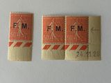 two stamps with the letters fm and f m on them