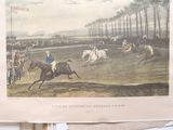 a picture of a horse race with jockeys and horses