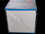 a white box with a blue lid on a black background