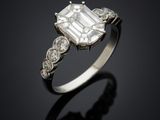 an emerald and diamond ring