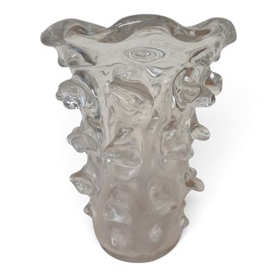 a clear glass vase with a design on it