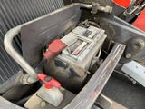 a car battery in the back of a truck