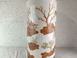a vase that has a design on it on a table