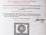 an old book with a picture of a lion on it