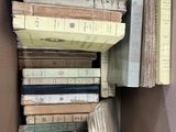 a box full of books sitting on the floor