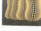 an image of a black and yellow painting with dots on it