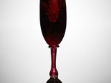 a wine glass that is sitting on a table