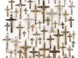 an image of a bunch of crosses that are on a wall