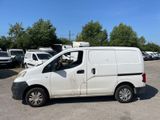 a white van that is parked in a parking lot