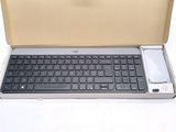 a box with a keyboard inside of it on a table