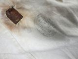 a piece of paper that has been left on the bed