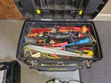 many tools in a tool case on the floor