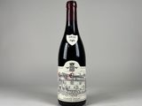 la bouteille de vin rouge est posée sur la table