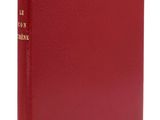 un livre à couverture rigide rouge avec des lettres dorées sur la couverture