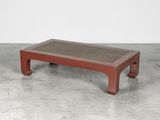 an image of a coffee table with a concrete top in a room