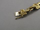 a gold chain with a lock attached to it