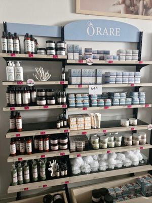 a shelf with many different products on it in a store