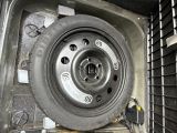 a close up of a tire inside of a vehicle