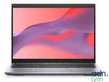 a laptop with a pink background and a grey keyboard
