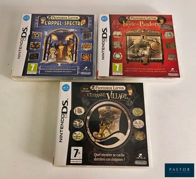 trois jeux Nintendo Wii posés sur une table blanche