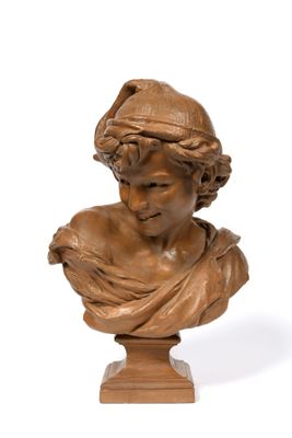 an antique bronze bust of a woman on a wooden base