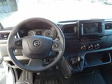 dashboard view of a car with a steering wheel and dashboard controls