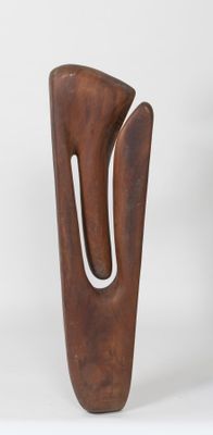 sculpture made of wood with a curved design on a white background