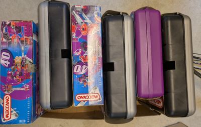 a lot of different types of luggage on the floor