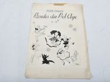 an old book with a drawing on it on a table