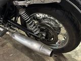 a motorcycle that is parked in a garage