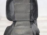 an image of a car seat that is in a room