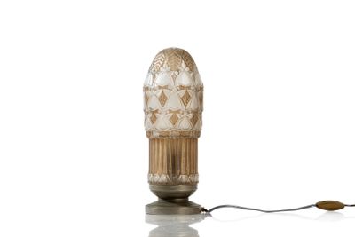a lamp that is on a table with a white background