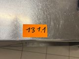 a metal table with a price tag on it