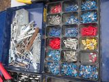 many different types of screws and nuts in a box