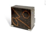 a small wooden box with a brown design on it