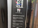 a sign on a machine that says seated row