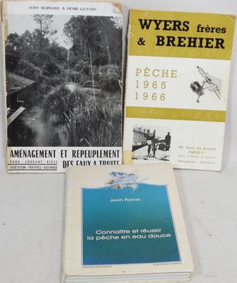 three books are sitting on a table next to each other