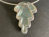sterling and sea glass angel pendant on a silver necklace